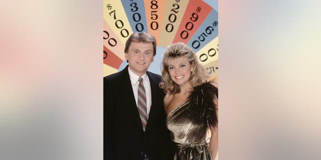 Pat Sajak and Vanna White are "Wheel of Fortune's" longtime hosts.