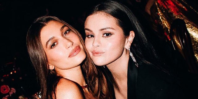 Selena Gomez and Hailey Bieber smile at event