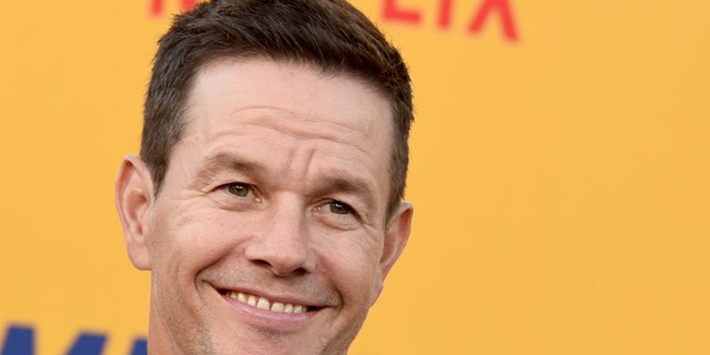 Mark Wahlberg smiles at the premiere of the movie "Me Time."