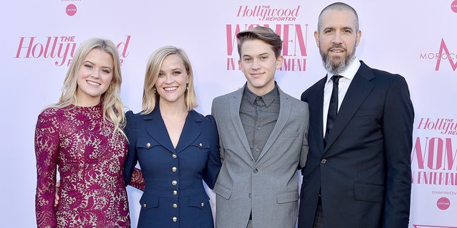 Reese Witherspoon poses with her children Ava and Deacon on red carpet with husband Jim Toth