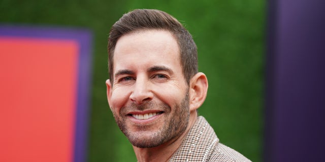 Tarek El Moussa smiling