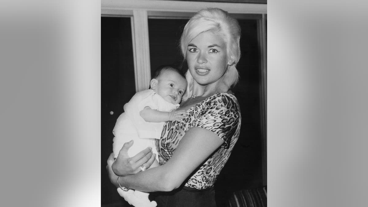 Jayne Mansfield holds six-week old Mariska Hargitay