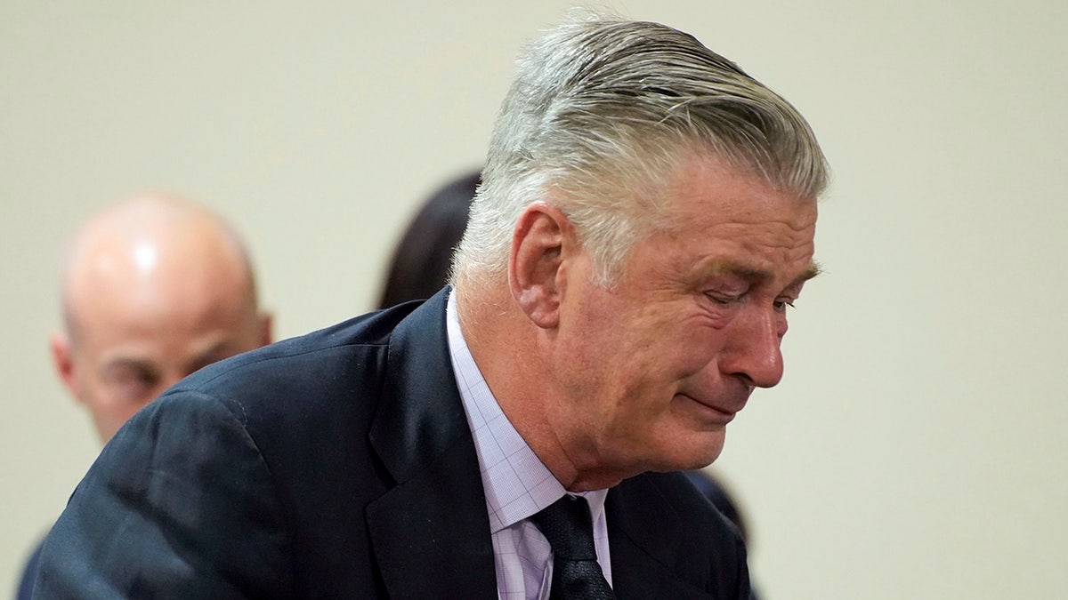 Actor Alec Baldwin cries during his trial for involuntary manslaughter