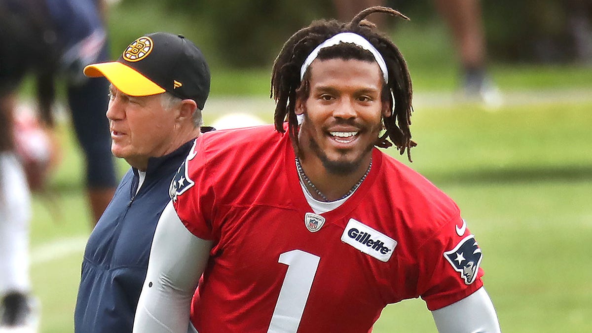 Cam Newton and Bill Belichick practice