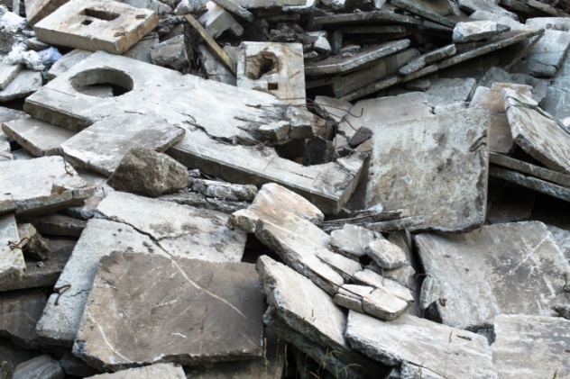 Heap of the damaged concrete blocks. Construction debris.