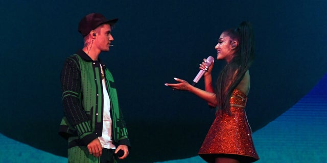 Justin Bieber, Ariana Grande performing