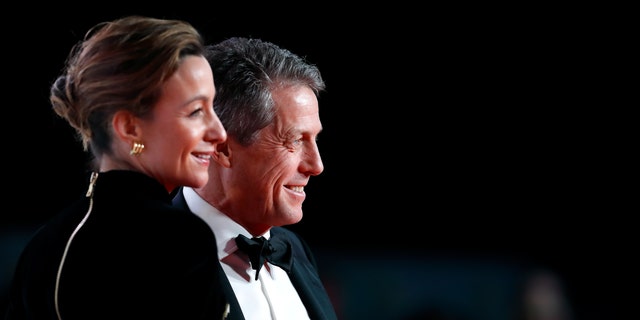 Hugh Grant and Anna Eberstein red carpet