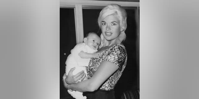 Jayne Mansfield holds six-week old Mariska Hargitay