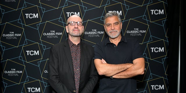 Steven Soderbergh, left, and George Clooney attend the screening of "Ocean's Eleven" during the 2023 TCM Classic Film Festival.