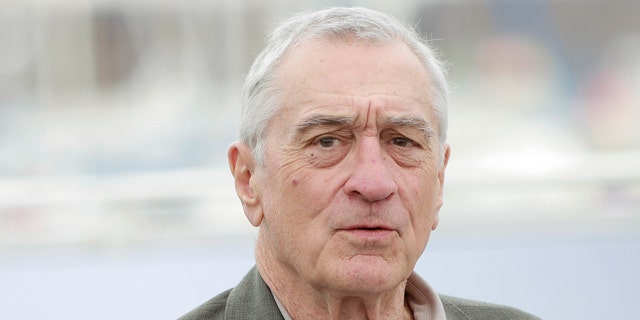 Robert De Niro looks serious on the carpet in Cannes