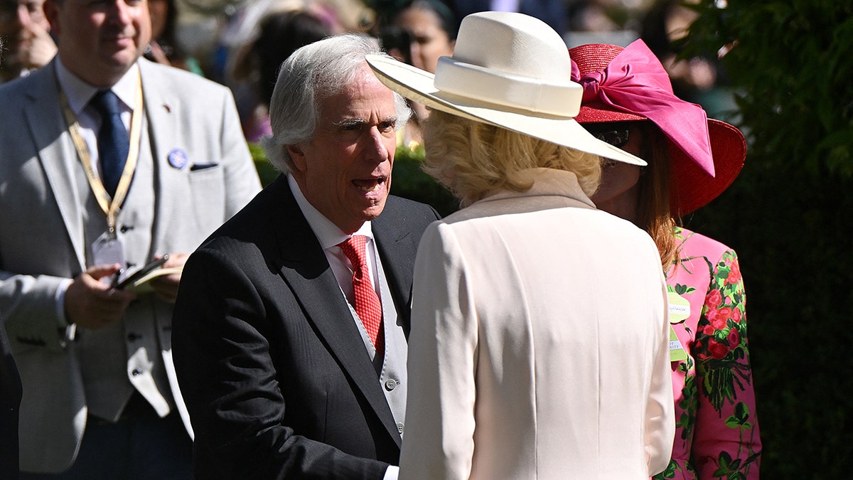 Henry Winkler greeting Queen Camilla.