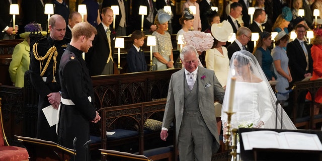 Prince Charles walking Meghan Markle down the aisle on her wedding day