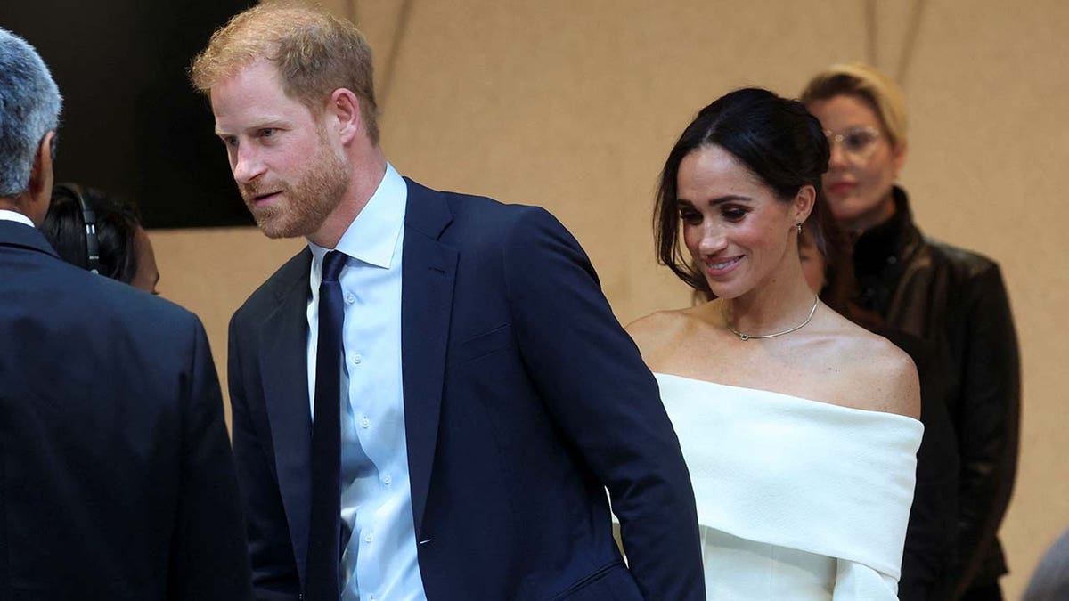 Prince Harry and Meghan Markle arrive at an event in New York City