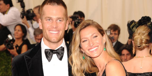 Tom Brady and Gisele smile for a photo