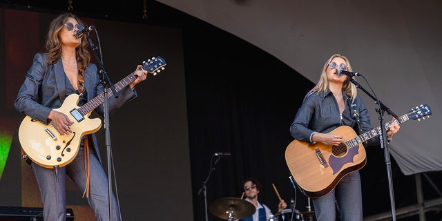 Aly & AJ performing