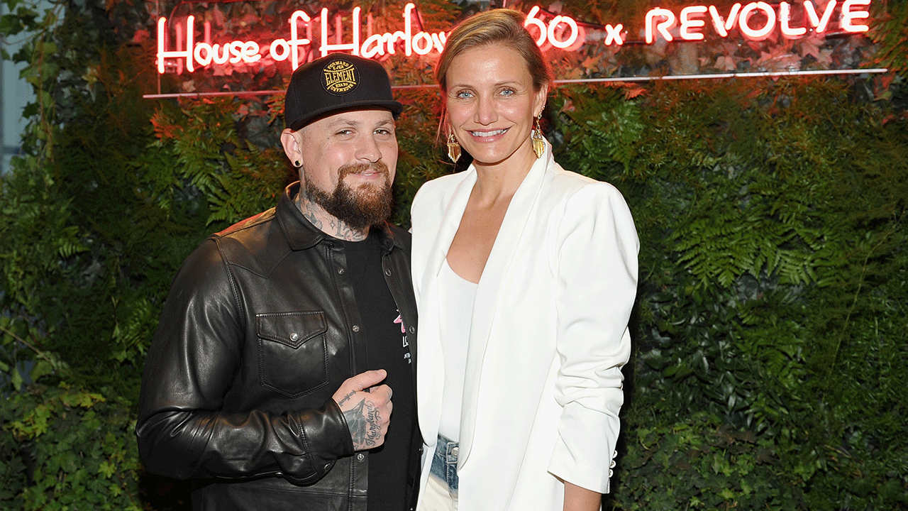 Benji Madden and Cameron Diaz smiling