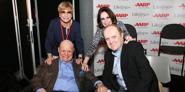 Don Rickles smiles alongside Barbara Rickles, Bob Newhart and Ginnie Newhart in Las Vegas