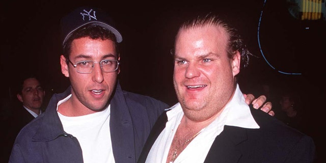 Adam Sandler wraps his arm around Chris Farley