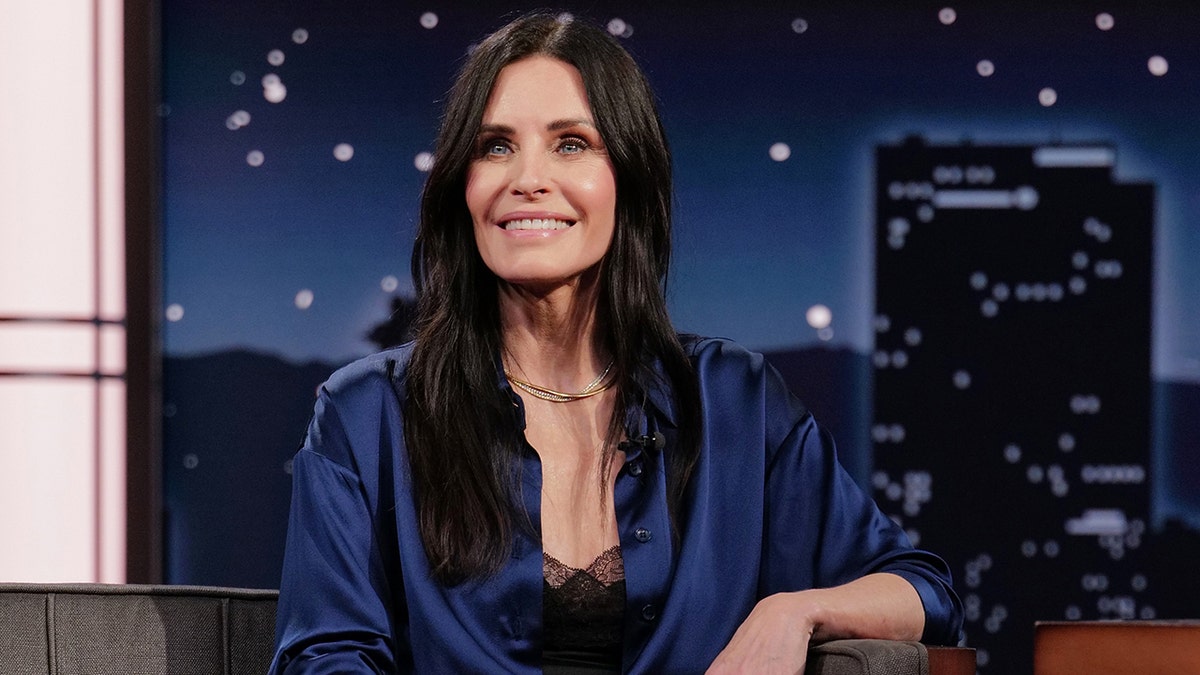 Courteney Cox in a blue dress on "Jimmy Kimmel Live!"