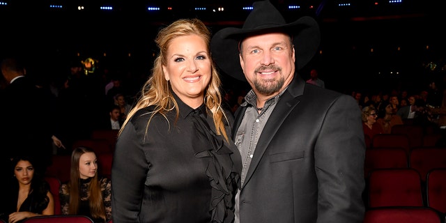 Garth Brooks with Trisha Yearwood at an event