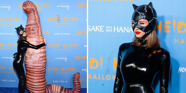 Leni Klum as Catwoman giving her mom Heidi Klum, dressed as a worm, a hug.