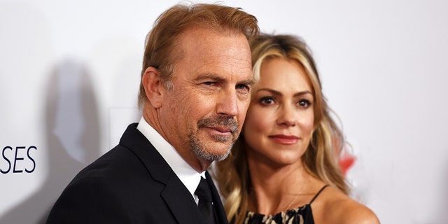 Kevin Costner and Christine Baumgartner attend red carpet event