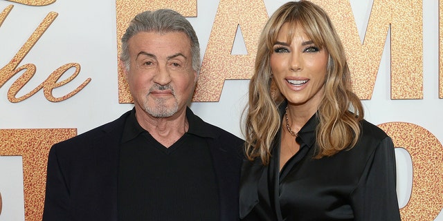 Jennifer Flavin and Sylvester Stallone at a red carpet event for "The Family Stallone"